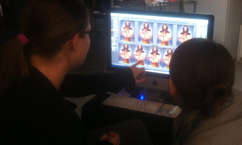 Perched behind Kirsten and watching the magic unfold.